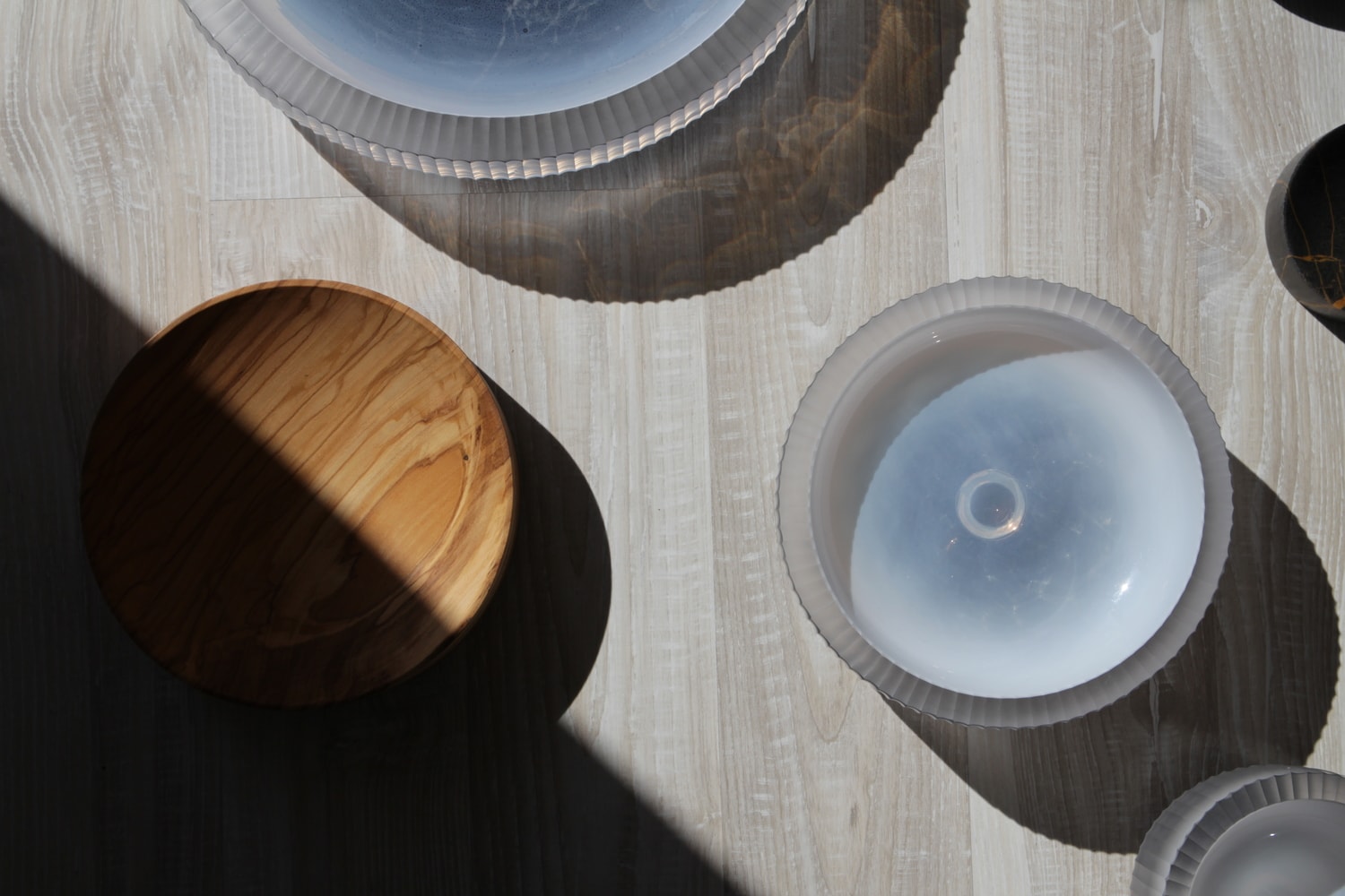 Unbalance Glass Bowls made out of Crystal and Wood in Interior