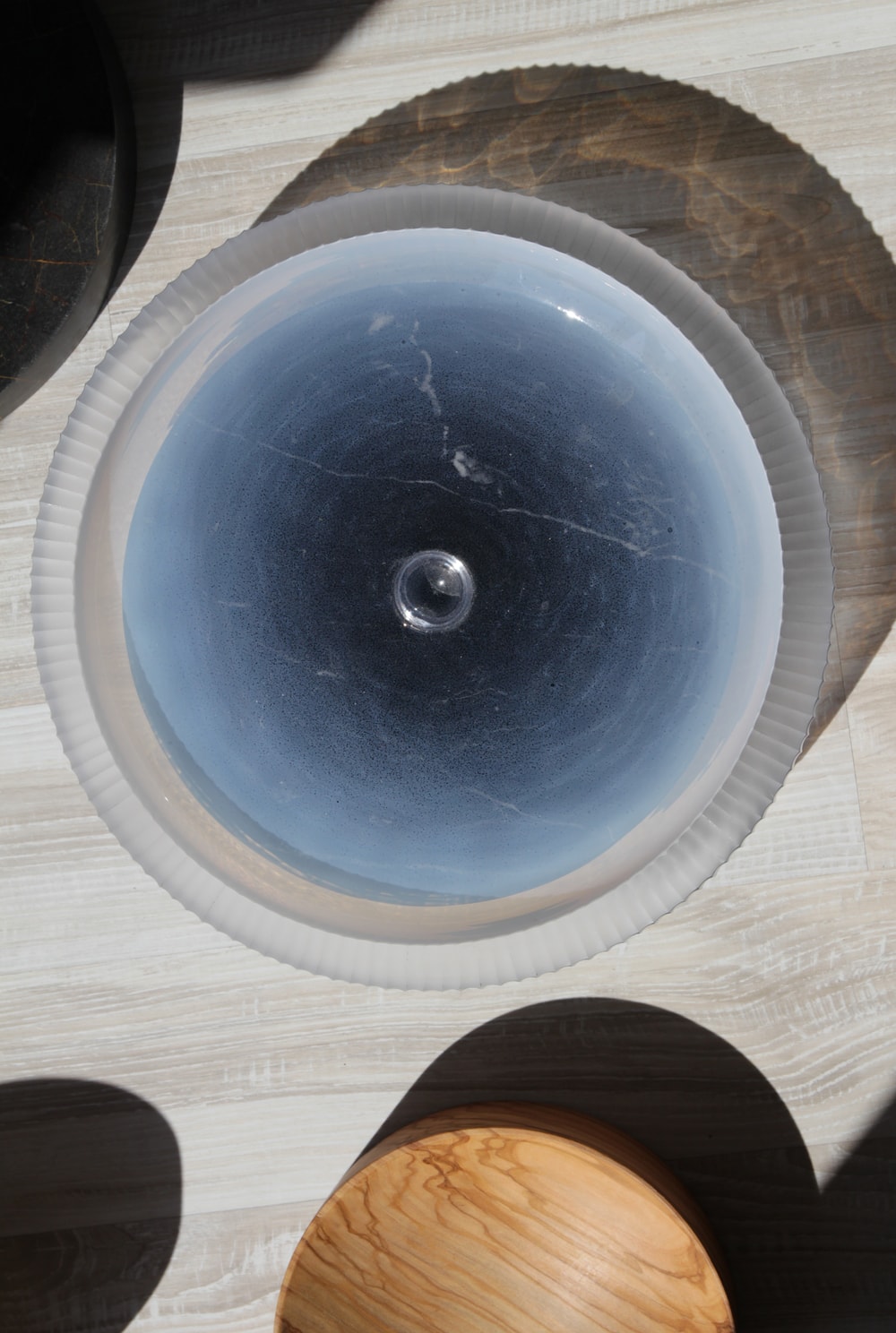 unbalance glass bowls objects crystal wood marble pedestals sklo mísy bytovy doplnek czech design jiri krejcirik 
