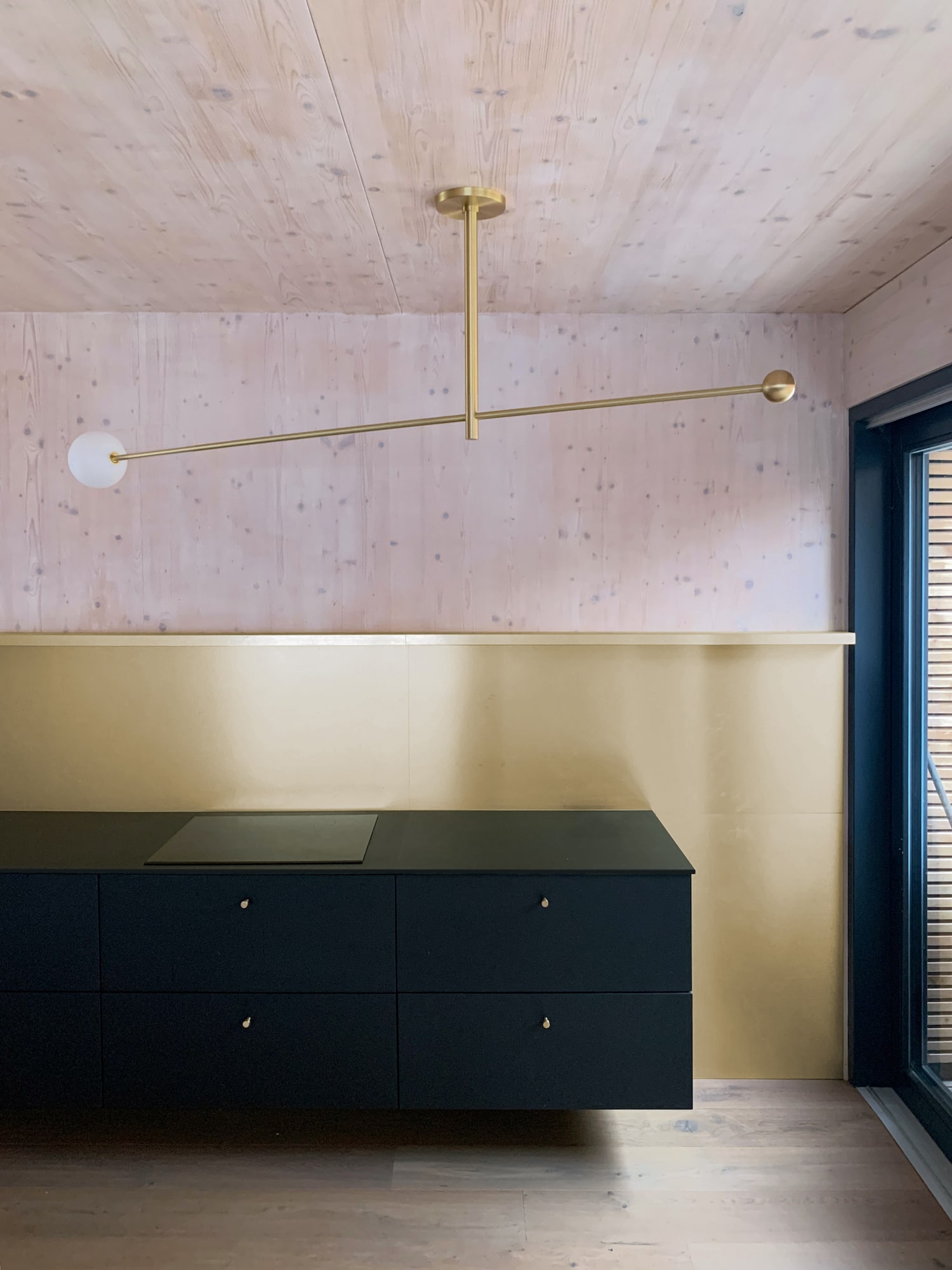 Solitary Rotatable Luna Orbit Kinetic Luminaire Made out of Brass and Steel in Interior