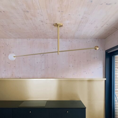 Rotatable Luna Orbit Kinetic Luminaire Made out of Brass and Steel in Interior Solitary