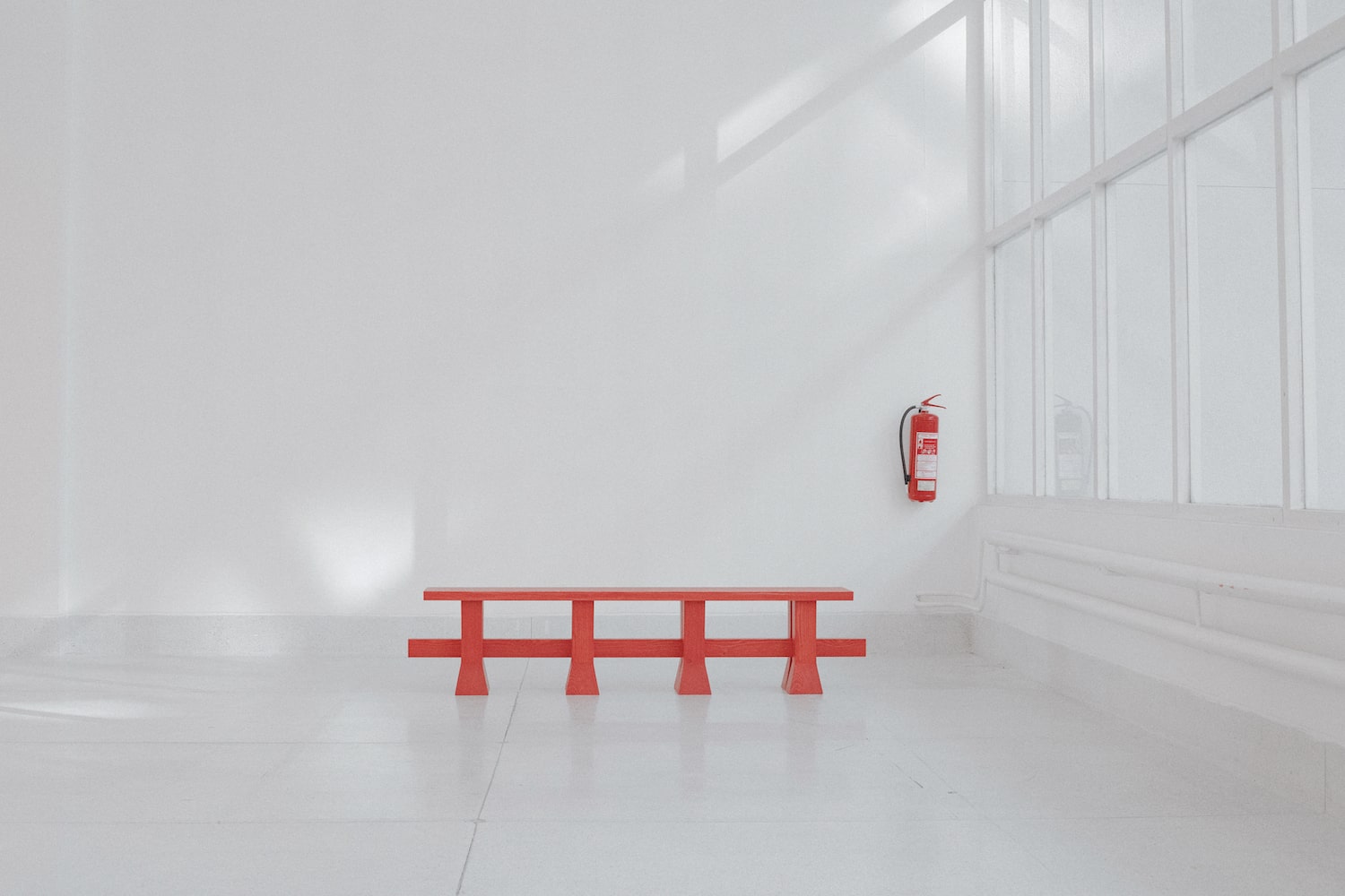 Arnaud-minimalistic-red-wooden-bench_Designed-by-Jiri-Krejcirik